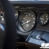 A view of the dials behind the steering wheel in a Lamborghini Miura