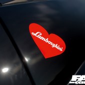 A red heart sticker on a Lamborghini Miura