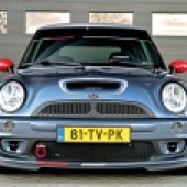 A low front central shot of a dark grey Mini Cooper S GP R53