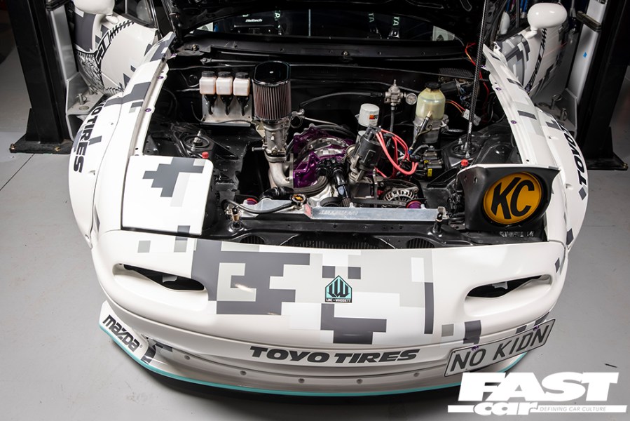 An aerial view of the engine in a Mazda MX 5 drift car
