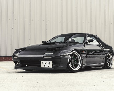 Front left shot of a black Mazda FC RX 7