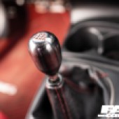 A focused close up of the gear stick in a Honda Integra Type R