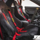 A view through the passenger door of a modified Nissan Skyline R32 GT R