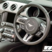 A view of the steering wheel in a Mustang GT4