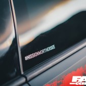 A close up of a window sticker on a Revo VW Golf R
