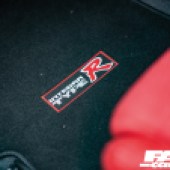 A type R embroidery in the carpet of a Spoon Integra DC2