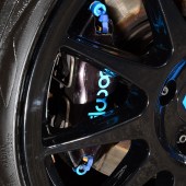 Close up of the blue and black alloys of a Renault Clio Sport 182