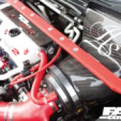 A view of the red and black engine inside a Honda Civic Type R