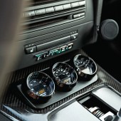 A close up of the central controls inside a tuned BMW E92 335i