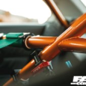 Orange metal bars inside a tuned BMW E92 335i