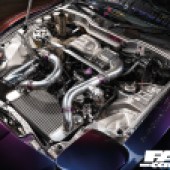 The engine bay of a tuned FD RX-7.