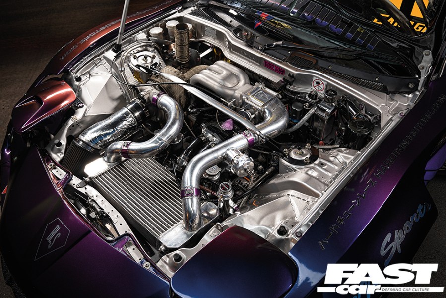 The engine bay of a tuned FD RX-7.