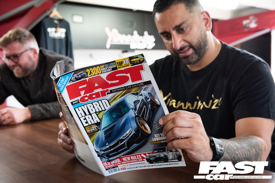 YIANNIMIZE reading Fast Car magazine